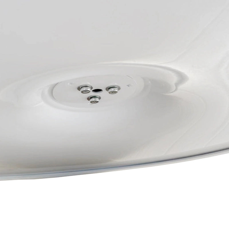 Tavolo da pranzo moderno con piano rotondo e base in metallo