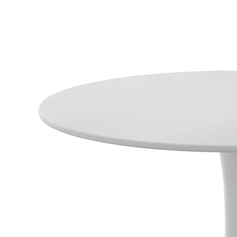 Tavolo da pranzo moderno con piano rotondo e base in metallo