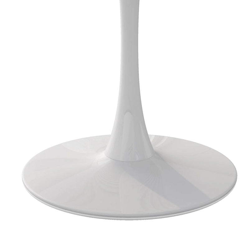 Tavolo da pranzo moderno con piano rotondo e base in metallo