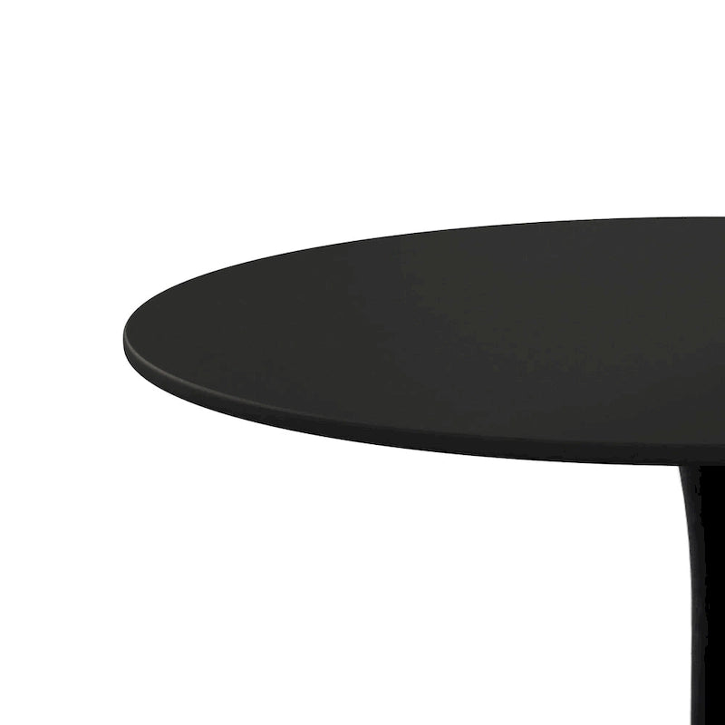 Tavolo da pranzo moderno con piano rotondo e base in metallo
